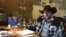 FILE - Ammon Bundy sits at a desk he's using at the Malheur National Wildlife Refuge in Oregon, Jan. 22, 2016. The jailed leader of an armed group that took over an Oregon wildlife preserve struck a defiant tone Tuesday while again urging four holdouts to leave.