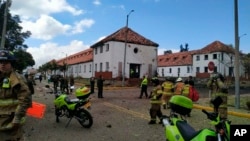 La scène de l’attentat à la voiture piégée dans une académie de police le jeudi 17 janvier 2019 à Bogota en Colombie. (Photo AP)