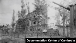 Office S-21, the Khmer Rouge central security office on the site of former Toul Sleng Secondary School, shortly after the overthrown of the DK regime, 1979. (Source: Documentation Center of Cambodia Archive)