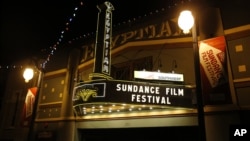 FILE - The marquee at the Egyptian Theatre on Main Street is seen at night during the 2013 Sundance Film Festival in Park City, Utah, Jan. 17, 2013.