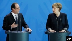 Fransiya rahbari Fransua Olland va Germaniya kansleri Angela Merkel