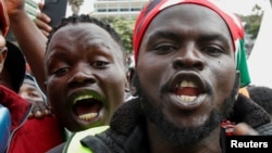 People react during a concert in memory of people who were killed during a demonstration against the imposition of tax hikes, in Nairobi, Kenya, July 7, 2024. The deadly protests led President William Ruto to reject the increases.