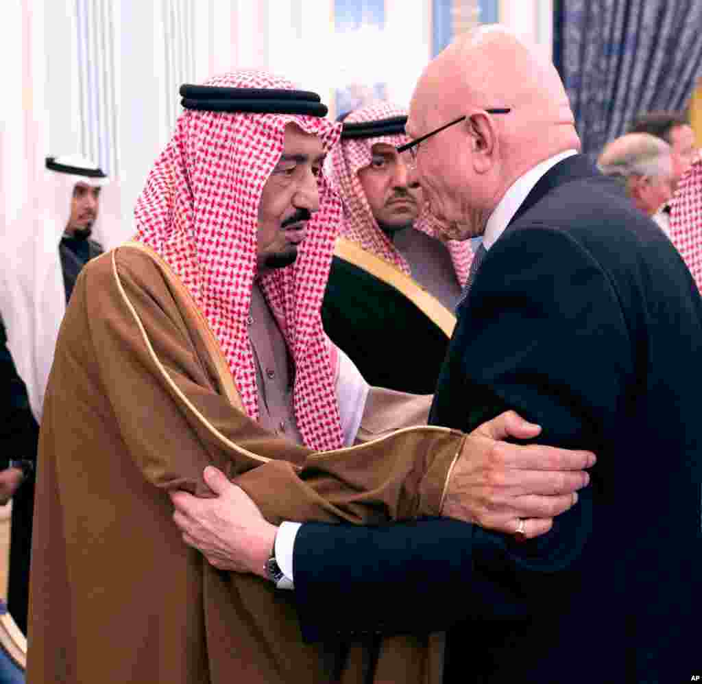 Lebanese Prime Minister Tammam Salam, right, gives his country's condolences for Saudi King Abdullah, who died early Friday at age 90, to the newly enthroned King Salman, in Riyadh, Saudi Arabia, Jan. 24, 2015.