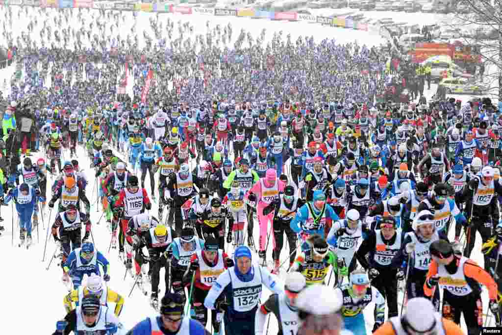 People take part in the long distance cross country ski competition Vasaloppet in Salen, Sweden.