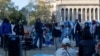 Frank Guridy, a Columbia University history professor who teaches a course called "Columbia 1968," speaks to students at the protest encampment on campus, maintained by student protesters of the Israel-Hamas war, in New York on April 25, 2024.