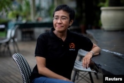 FILE - Filipino journalist and Rappler CEO Maria Ressa speaks during an interview in Taguig City, Metro Manila, Philippines, Oct. 9, 2021.