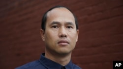 FILE - Borey Ai served 19 years in prison before parole officials decided he'd turned his life around and he walked out of San Quentin. The California Supreme Court has blocked Gov. Jerry Brown's pardon of the 37-year-old Cambodian refugee.