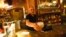 A waiter serves a drink at Cafe Savoy, which is a lesbian, a gay, bisexual and transgender (LGBT) cafe, in Vienna, Austria, Mar. 20, 2013.
