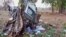 In this grab made from video provided by KK Productions, the wreckage of a car which came under an IED (improvised explosive device) blast is seen in the Dantewada district of Chhattisgarh, India, April 9, 2019. 
