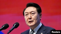 FFOTO FILE: Presiden Korea Selatan Yoon Suk Yeol dalam upacara peringatan 104 tahun Hari Gerakan Kemerdekaan 1 Maret melawan penjajahan Jepang, di Seoul, 1 Maret 2023. (Jung Yeon-Je / Pool via REUTERS)