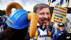 Rams fans rally Jan. 9, 2016, at the Los Angeles Memorial Coliseum.
