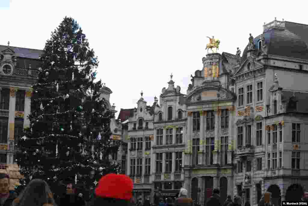 Despite terrorist fears some tourists enjoy Brussels&#39; spectacular buildings. The heavy security presence gets as much attention from tourists as the sights.