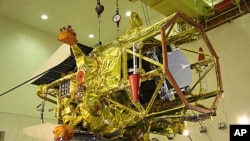 In this photo distributed by Russian Roscosmos space agency on November 9, 2011, the unmanned Phobos probe is seen at the Baikonur Cosmodrome in Kazakhstan.