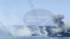 用户生成内容(UGC)视频截图显示，位于克里米亚半岛塞瓦斯托波尔的俄罗斯黑海舰队总部冒出浓烟。(2023年9月23日，美联社转自克里米亚电报平台)