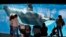 FILE - In this Nov. 30, 2006, file photo, people watch through glass as a killer whale swims by in a display tank at SeaWorld in San Diego. A SeaWorld executive says orca shows at the company's San Diego park will end by 2017.
