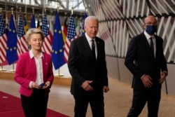European Commission President Ursula von der Leyen, left, U.S. President Joe Biden, center and European Council President Charles Michel arrive for the EU-US summit at the European Council building in Brussels, June 15, 2021.