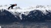 Ryoyu Kobayashi of Japan soars through the air during the trial round of the third stage of the 68th four hills ski jumping tournament in Innsbruck, Austria.