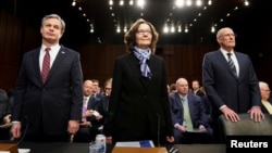 From left, FBI Director Christopher Wray, CIA Director Gina Haspel and Director of National Intelligence Dan Coats testify before a Senate Intelligence Committee hearing January 29, 2019. (REUTERS/Joshua Roberts)