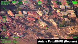 An aerial view of the city of Palu after an earthquake hit Sulawesi Island, Indonesia, Sept. 29, 2018. Screen display information provided at source.