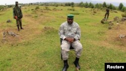 FILE - Congolese M23 rebel leader Bertrand Bisimwa speaks to the media in Bunagana, DRC.