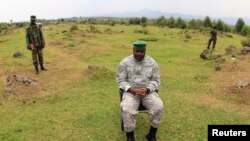 Mokambi ya batomboki ba M23 Bisimwa Bertrand na Bunagana, Rutushuru, Nord-Kivu, RDC, 2 aout 2013. (file)