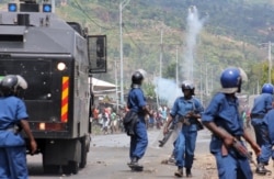 FILE - Riot policemen try disperse protesters demonstrating against the decision to allow Burundi President Pierre Nkurunziza to run for a third term, in Bujumbura, May 4, 2015, in this photo taken by Reuters photojournalist Jean Pierre Aime Harerimana.
