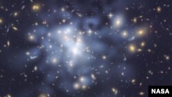 FILE - NASA Hubble Space Telescope image shows the distribution of dark matter in the center of the giant galaxy cluster Abell 1689, containing about 1,000 ., (File photo).