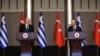 Turkish Foreign Minister Mevlut Cavusoglu and his Greek counterpart Nikos Dendias hold a news conference in Ankara, Turkey, April 15, 2021. (Turkish Foreign Ministry/Handout via Reuters)