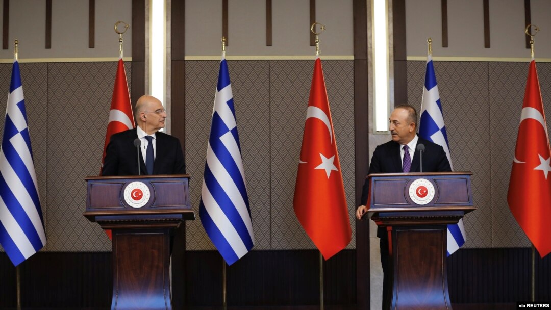 Turkish Foreign Minister Mevlut Cavusoglu and his Greek counterpart Nikos Dendias hold a news conference in Ankara, Turkey, April 15, 2021. (Turkish Foreign Ministry/Handout via Reuters)
