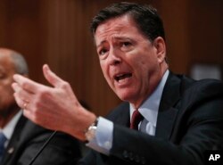 FILE - FBI Director James Comey testifies on Capitol Hill in Washington, Sept. 27, 2016.