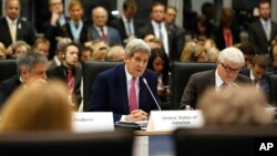 U.S. Secretary of State John Kerry talks during the OSCE Ministerial Council meeting in Belgrade, Serbia, Dec. 3, 2015.