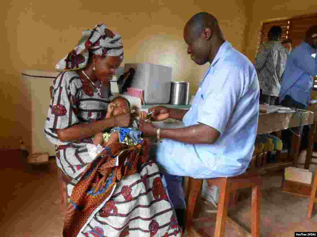 While this African baby gets an early childhood vaccination, 25 million children in developing countries don&rsquo;t receive such life-saving immunizations. (VaxTrac) 