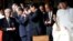 Group of Japanese lawmakers sip sake as they observe a Shinto ritual, Yasukuni Shrine, Tokyo, Oct. 18, 2013.