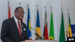 Malawi President Lazarus Chakwera makes an acceptance speech after taking over the Southern African Development Community (SADC) Chairmanship, in Lilongwe, Malawi, on Aug. 17, 2021.