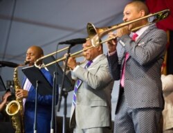 Branford Marsalis, Wynton Marsalis and Delfeayo Marsalis perform in the Ellis Marsalis Family Tribute in the Jazz Tent during the New Orleans Jazz & Heritage Festival in New Orleans, Louisiana on April 28, 2019.