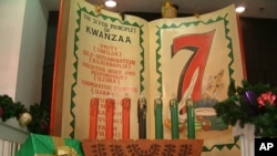 FILE - The seven tenets of Kwanzaa are unity, self-determination, collective work and responsibility, cooperative economics, purpose, creativity and faith.