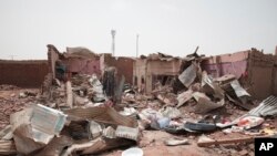 A house hit in recent fighting in Khartoum, Sudan, Tuesday, April 25, 2023. (AP Photo/Marwan Ali)