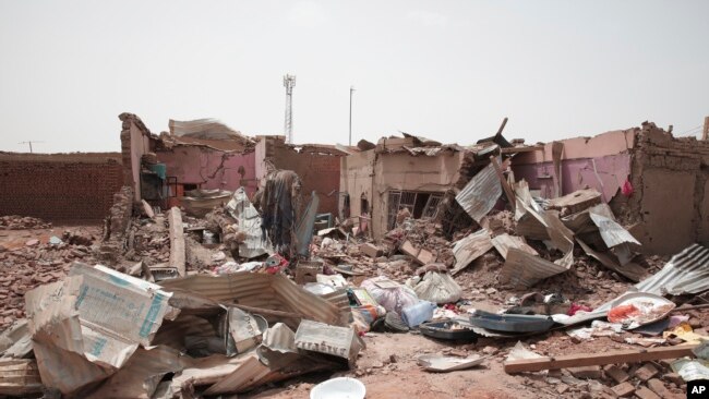 A house hit in recent fighting in Khartoum, Sudan, Tuesday, April 25, 2023. (AP Photo/Marwan Ali)