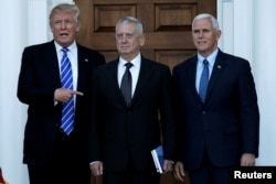 U.S. President-elect Donald Trump (L) and Vice President-elect Mike Pence (R) greet retired Marine General James Mattis in Bedminster, New Jersey, U.S., Nov. 19, 2016.