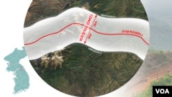 한반도 비무장지대(DMZ). 남북한을 분리하며 한반도를 가로지르는, 길이 250km(160마일)에 폭 4km(2.5마일) 규모의 삼엄하게 경비된 완충 지대다.