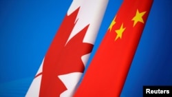 中国国旗与加拿大国旗（路透社资料图）