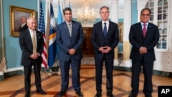 FILE - Marshall Islands Foreign Affairs Minister Jack Ading, Palau President Surangel Whipps, U.S. Secretary of State Antony Blinken and Micronesian President Wesley Simina meet in Washington on Sept. 26, 2023. A March 2024 pact among the four nations awaits full implementation.