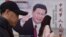 중국 공산당 제19기 중앙위원회 3차 전체회의가 26일 베이징에서 개막했다. 베이징 거리에 시진핑 국가주석의 모습을 담은 벽보가 붙어있다.