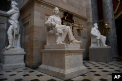 FILE - A statue of Alexander Stephens of Georgia is on display in Statuary Hall on Capitol Hill in Washington, June 11, 2020.