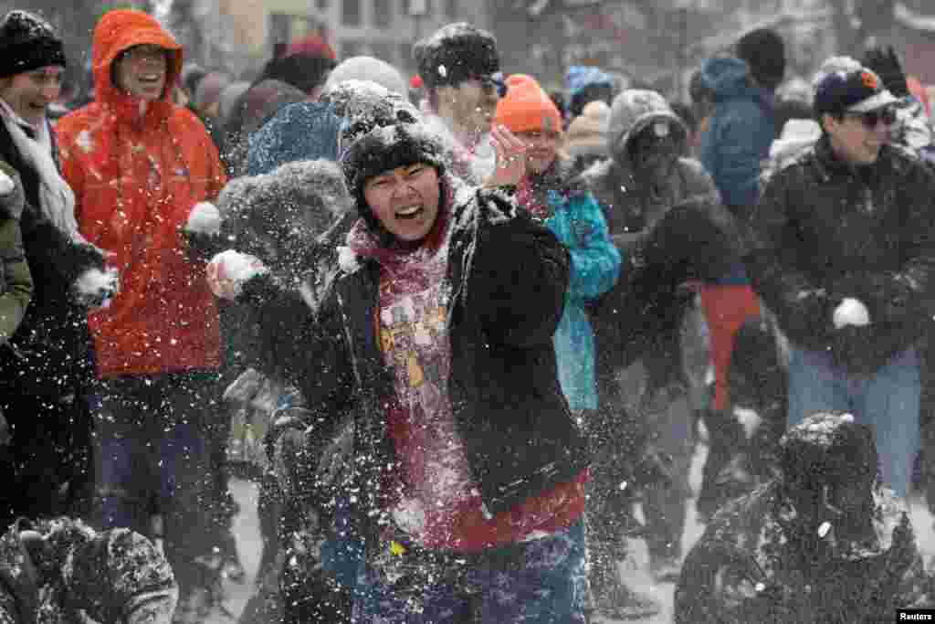 People participate in snowball fight at Meridian Hill Park, as a winter storm that brought snow, ice and freezing temperatures to a broad swath of the U.S. hits Washington, Jan. 6, 2025. 