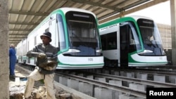 A worker works on the electrified light rail transit construction site in Ethiopia's capital Addis Ababa, Dec. 16, 2014. The project, built by China Railway Engineering Corporation (CREC) and mostly financed through a loan from China's Exim Bank, is a rarity on a continent plagued by poor transport links.