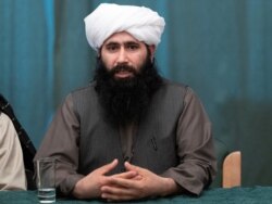 FILE - Mohammad Naeem, spokesman for the Taliban's political office, speaks in Moscow, Russia, March 19, 2021.