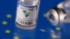 FILE - Vials labelled ‘Sinopharm coronavirus disease (COVID-19) vaccine’ displayed on an EU flag are seen in an illustration picture. Sinopharm is the first non-Western vaccine to be approved by the WHO.
