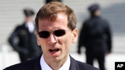 FILE - Lawyer Gregory Katsas speaks outside of the Supreme Court in Washington, March 26, 2012. 