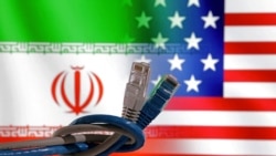 Kabel LAN terlihat di depan bendera AS dan Iran dalam ilustrasi yang diambil pada 23 April 2024. (Foto: Dado Ruvic/Reuters)